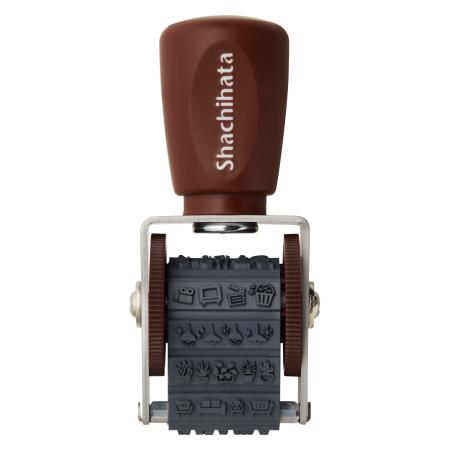 Mini-tampon rotatif compacte avec 10 motifs diff�rents.